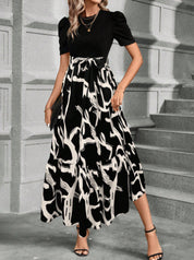 Cordelia Ashby | Robe midi à col rond et imprimé floral