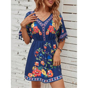 Esmeralda Fuentes | Bohemian Floral Print Mini Dress with Tassel Trim