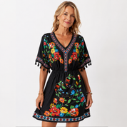 Esmeralda Fuentes | Bohemian Floral Print Mini Dress with Tassel Trim