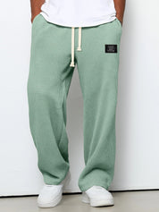 Bastian Holmgren | Men's Waffle-Knit Joggers Relaxed Fit in Steel Blue