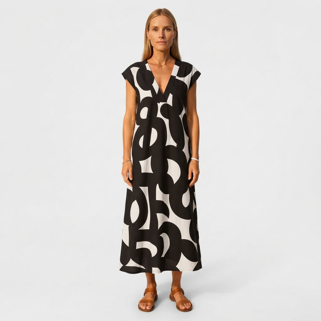 OdetteFairbrotherAbstractPrintMaxiDressWithV-Neck-mdoel.jpg