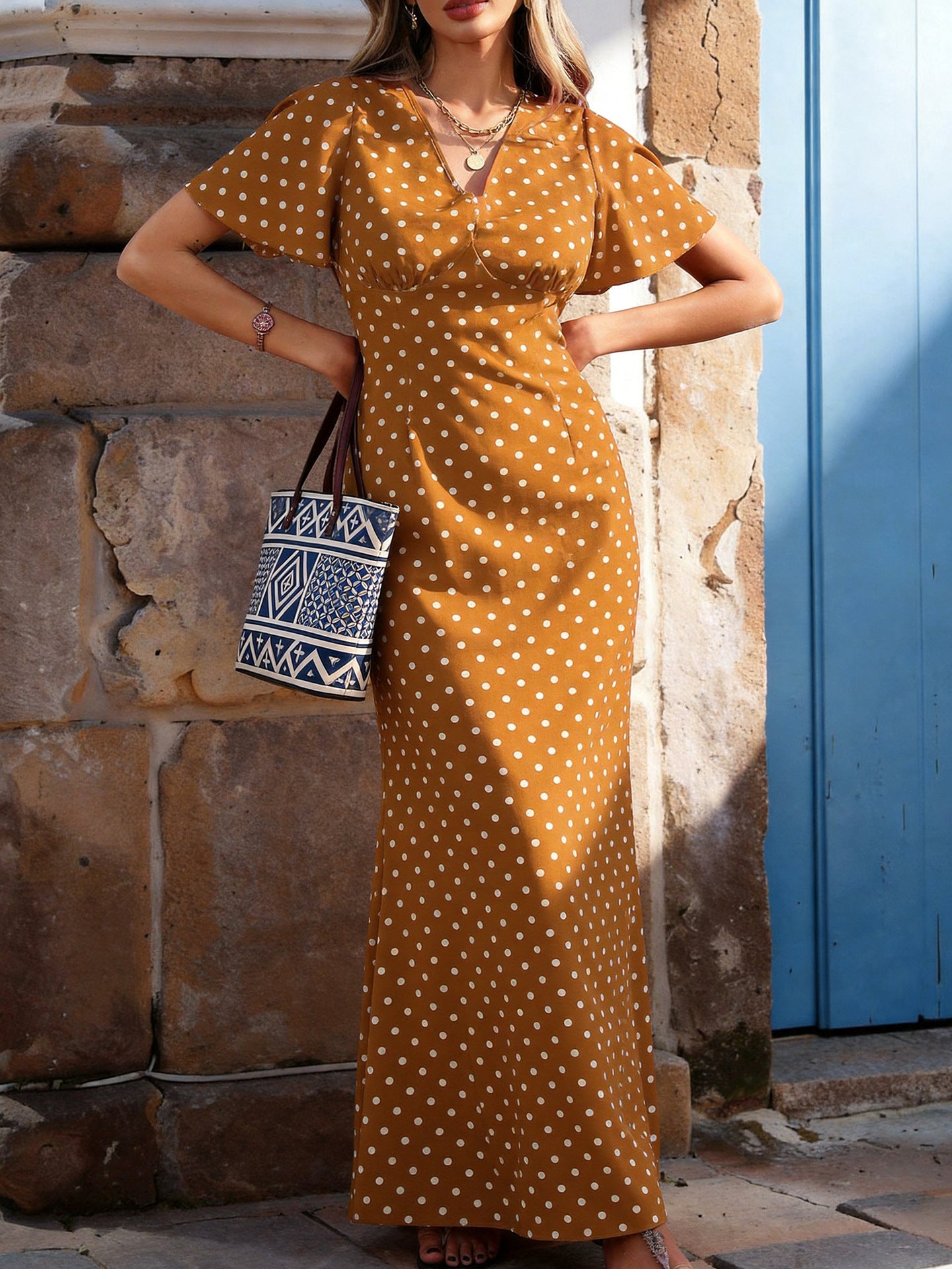 Emmeline Barclay | Robe longue à col V à pois