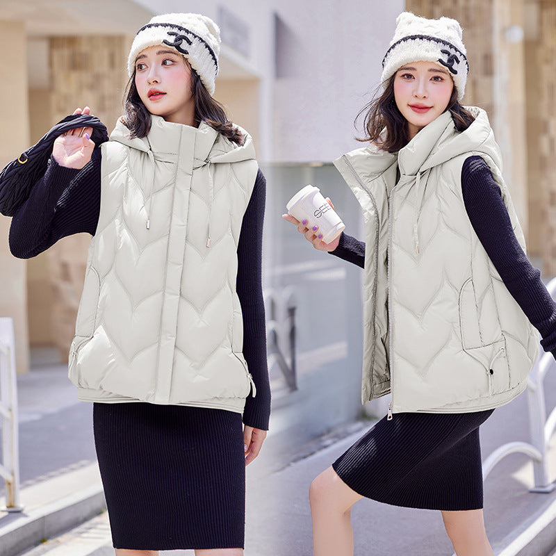Dorothea Mills | Gilet matelassé à capuche amovible, veste sans manches isolante