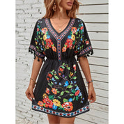 Esmeralda Fuentes | Bohemian Floral Print Mini Dress with Tassel Trim
