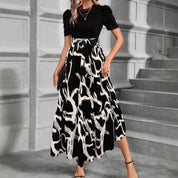 Cordelia Ashby | Robe midi à col rond et imprimé floral