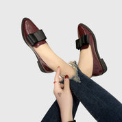 Margot Ashcombe | Patent Leather Loafers With Bow Detail