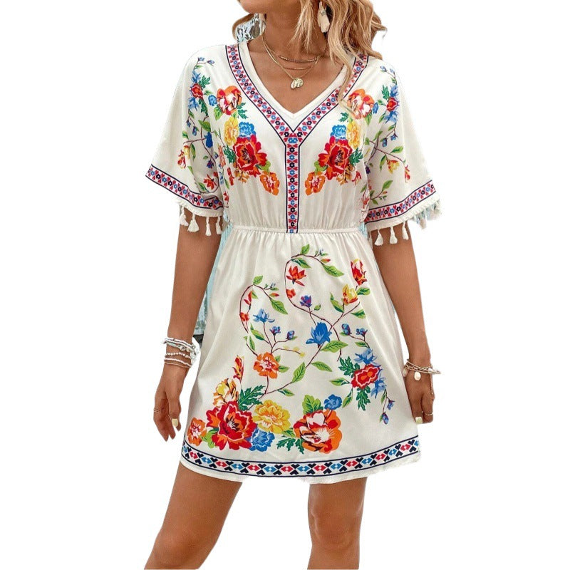 Esmeralda Fuentes | Bohemian Floral Print Mini Dress with Tassel Trim