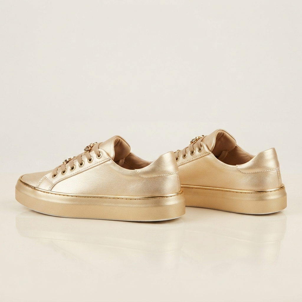 felicity-reynolds-black-platform-sneakers-gold-detail-urban-edge.png