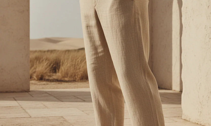 generate-a-image-of-a-men-wearing-linen-pants-in-a-beige-enviroment-focus-on-the-pants.webp