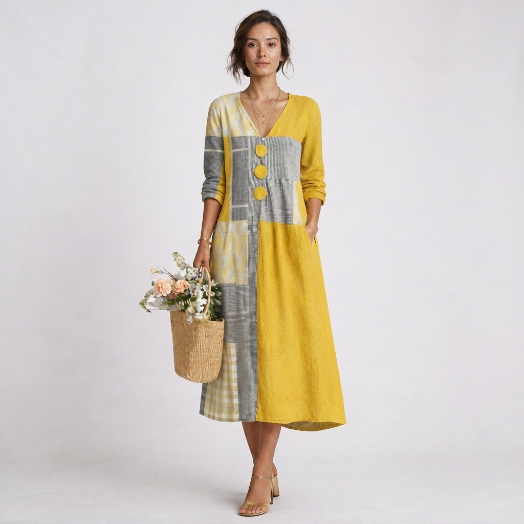 marisol-quintero-patchwork-midi-dress-with-button-detail-and-relaxed-fit.jpg