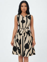 Millicent Baker | Robe midi trapèze ceinturée